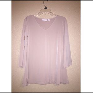 Blouse with decorative open arm detail